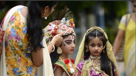 Dressing up as the Lord and Radha