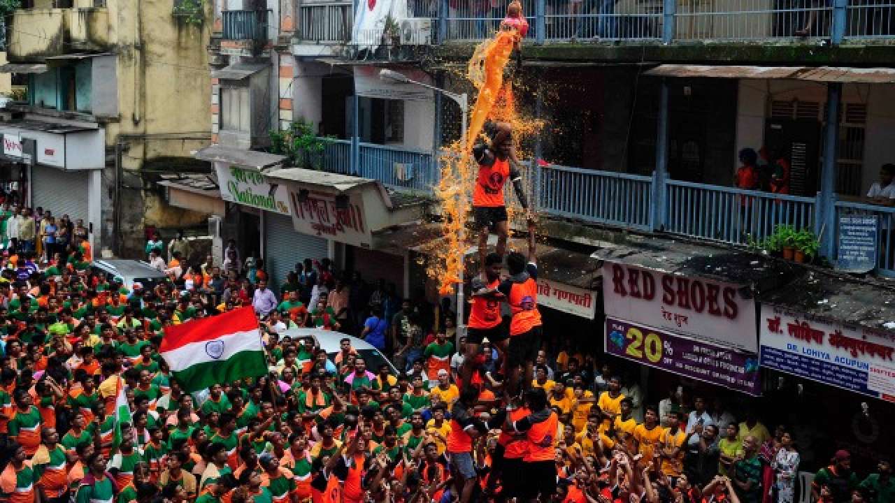 Youth forming a human pyramid to break a Dahi Handi in Mumbai