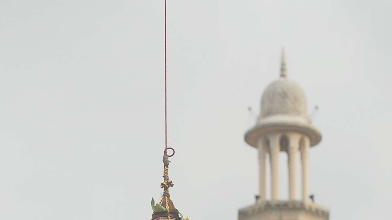 Boys break a Dahi Handi during celebration