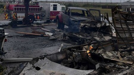 Hurricane makes strong landfalls, burning down houses