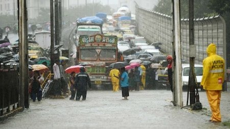 Vehicles in a traffic jam on a flooded road