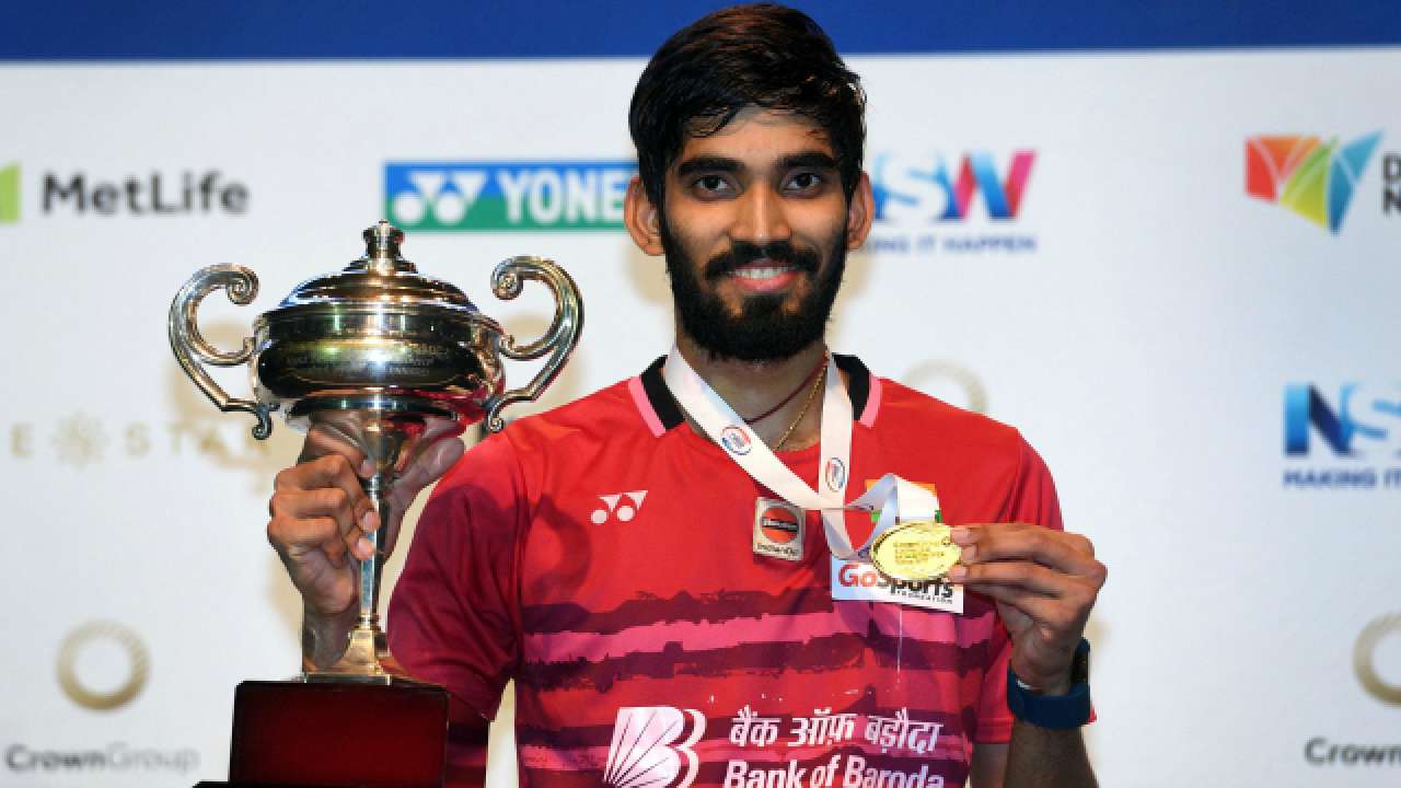 Kidambi poses with his trophy and medal