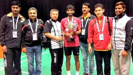 Kidambi with his support staff