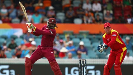 Chris Gayle (L) blasted a memorable double-century against Zimbabwe at Canberra