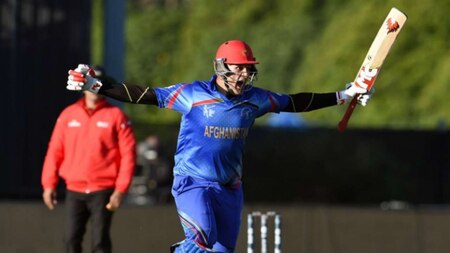 Hamid Hassan celebrates after Afghanistan's historic win over Scotland at Dunedin