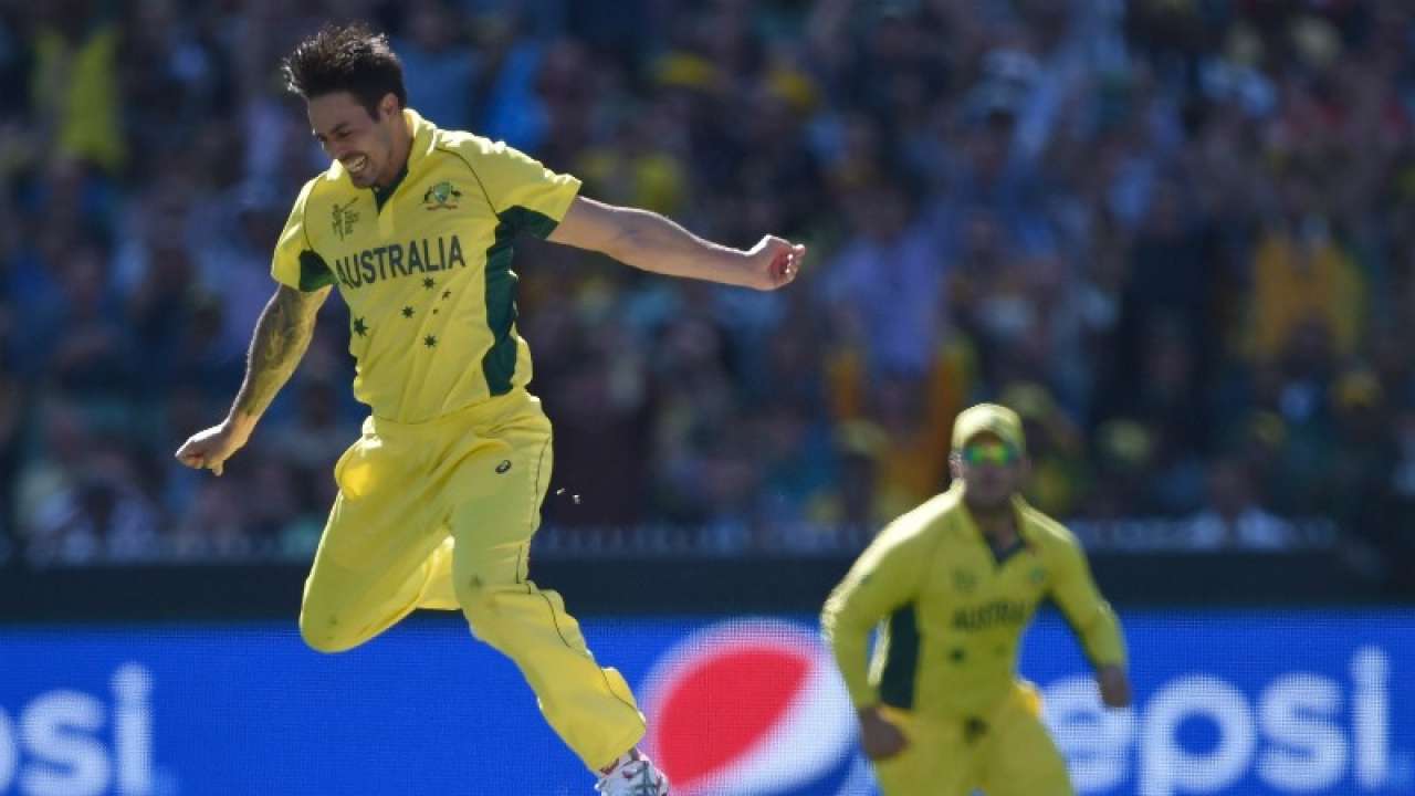 Mitchell Johnson (L) is jubilant after getting the wicket of Kane Williamson