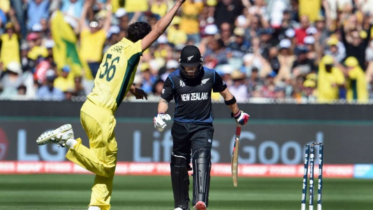 Mitchell Starc (L) cleans up danger man Brendon McCullum (R)