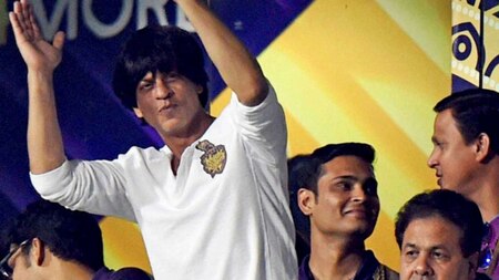 KKR owner Bollywood actor Shah Rukh Khan cheers his team during IPL 2015 first match aganst Mumbai Indians