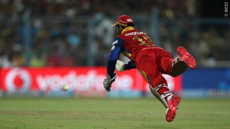 RCB's Dinesh Karthik effects a fine stop
