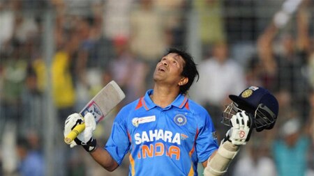 Sachin raises his bat for the 100th time in his career, as he scores his 100th century in international cricket