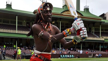 A Maasai Warrior gets ready to bat