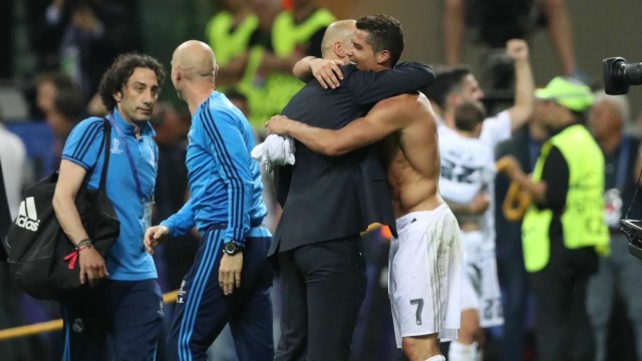 Real Madrid's Cristiano Ronaldo and coach Zinedine Zidane