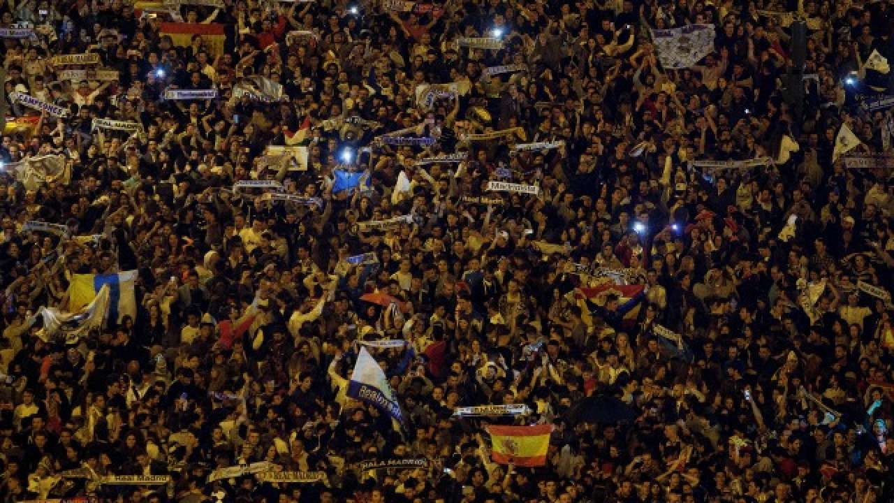 Real Madrid fans celebrate at Cibeles Square