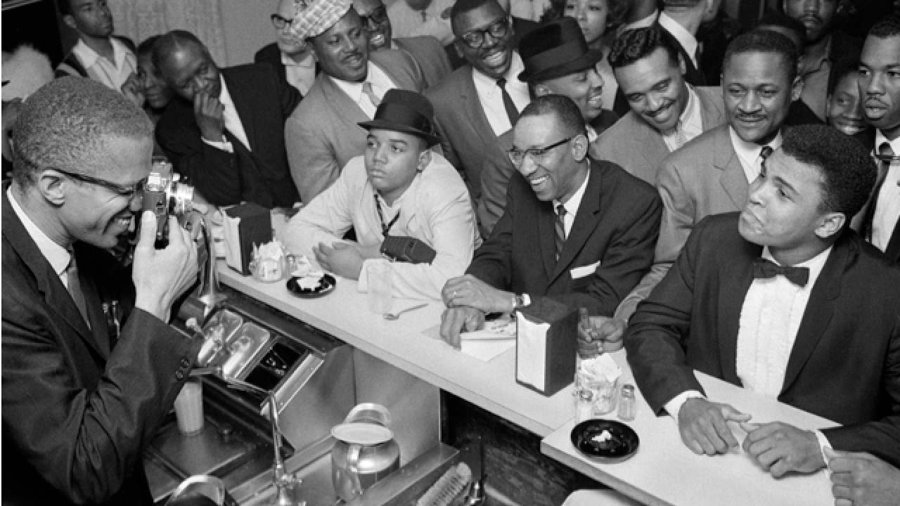 Malcolm X photographs Muhammad Ali
