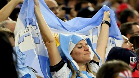 Argentinean fan holds up the flag
