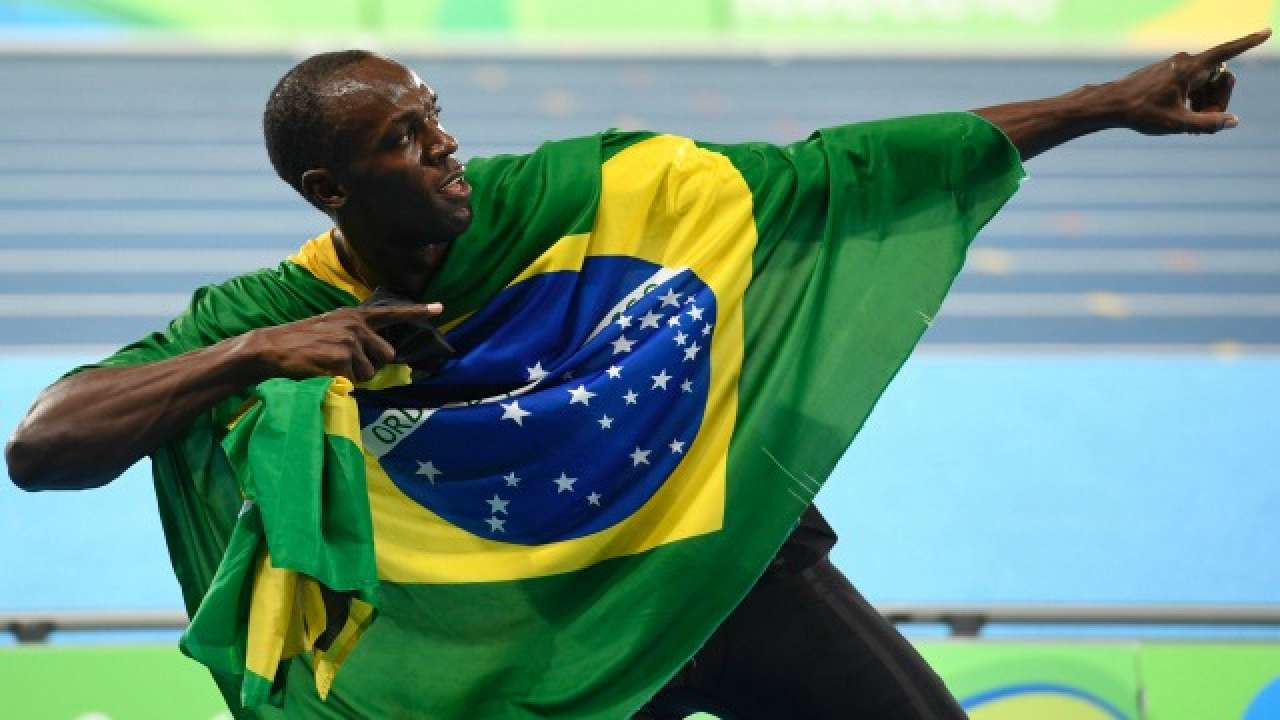 In pictures | rio 2016: legendary 'triple-triple' for usain bolt, marin-sindhu's match dominate day 14