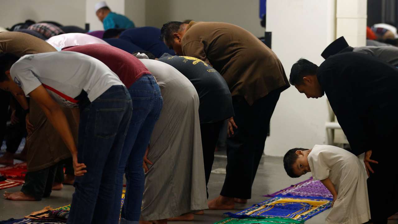 People perform tarawih prayers