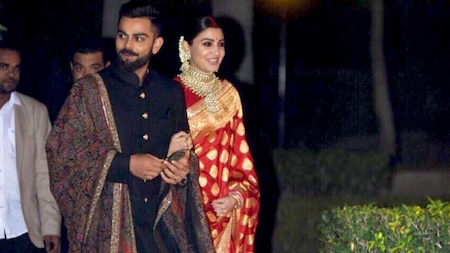 Virat Kohli and Anushka Sharma arrive in style for their Wedding Reception