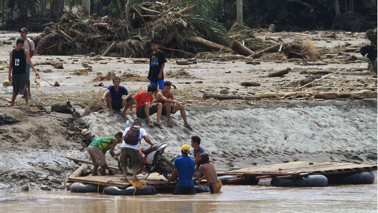 Over 100 dead in Philippine mudslides and flash floods