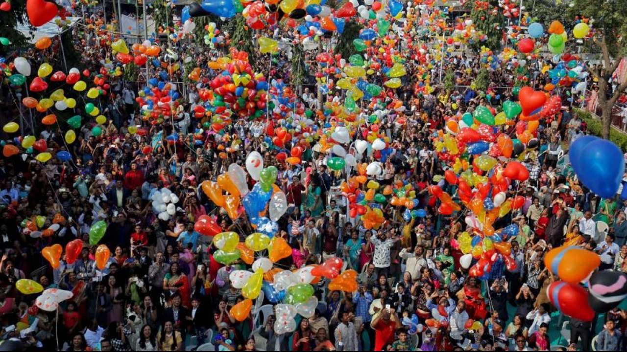 People release balloons during New Year celebrations