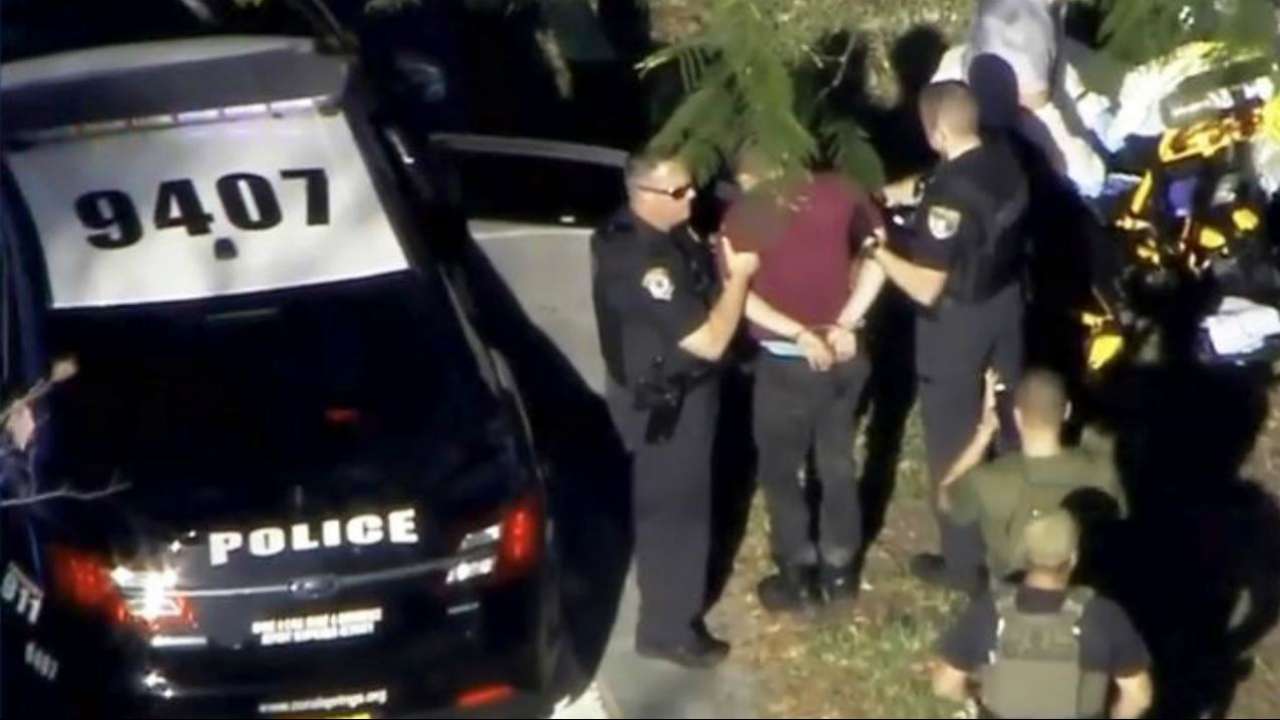 Man placed in handcuffs