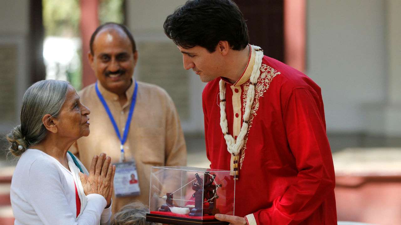 Canadian PM Justin Trudeau receives a memento