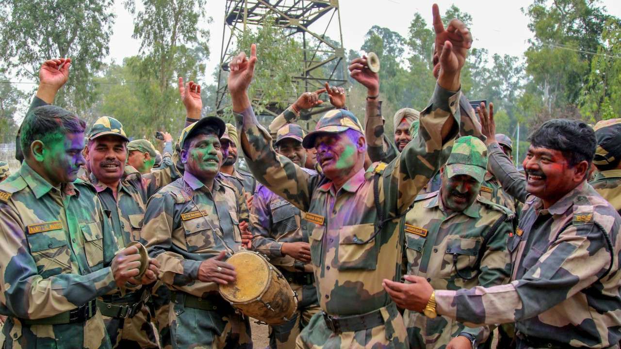Army men playing Holi