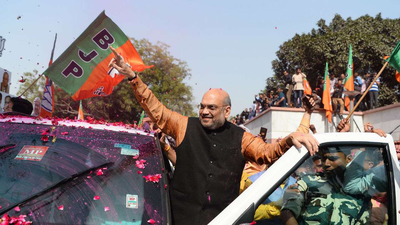 Amit Shah celebrates the state election results