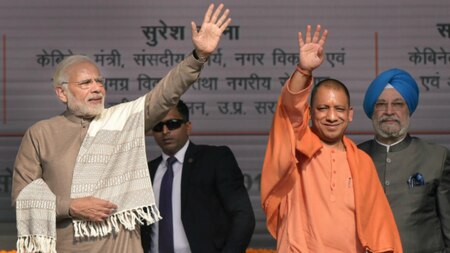 PM Modi and UP CM Yogi Adityanath wave