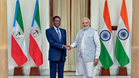 Prime Minister Narendra Modi shakes hands with Equatorial Guinea President Teodoro Obiang Nguema Mbasogo