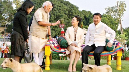 Modi shares a light moment with Chinese President Xi Jinping and his wife in Ahmedabad