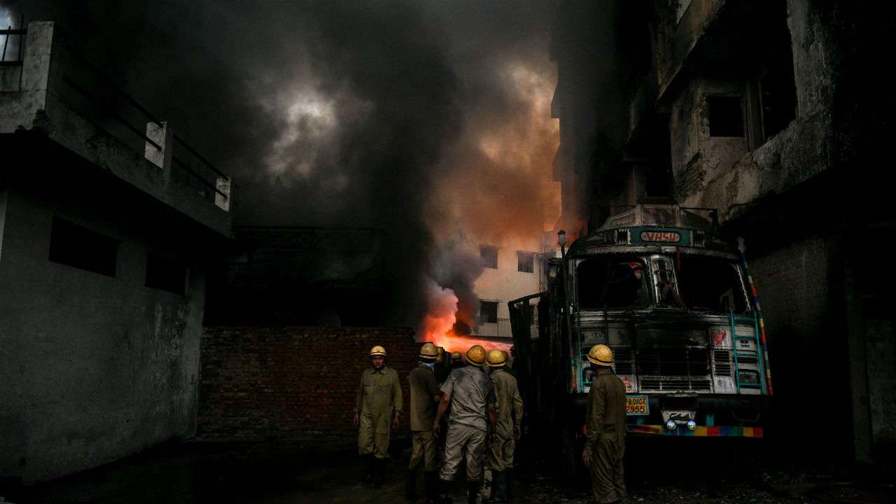 In Pics: Smoke covers south Delhi skyline as 'highest category' of fire engulfs Malviya Nagar godown
