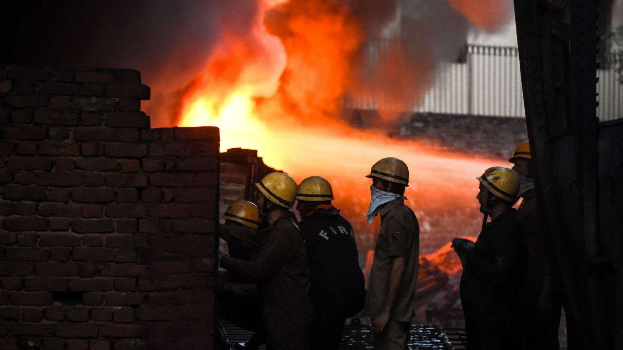 In Pics: Smoke covers south Delhi skyline as 'highest category' of fire engulfs Malviya Nagar godown