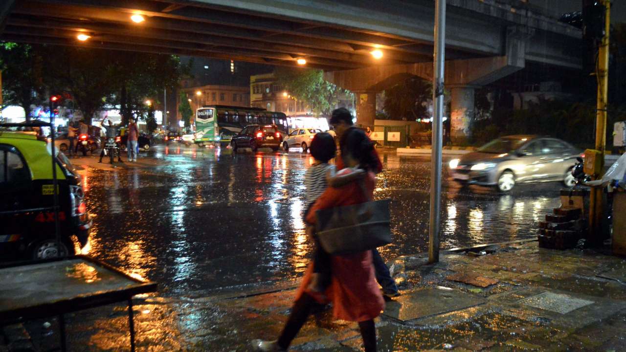 Heavy Pre Monsoon Rain Hits Mumbai S Local Train Service Delays Flights Adds To Traffic Snarls