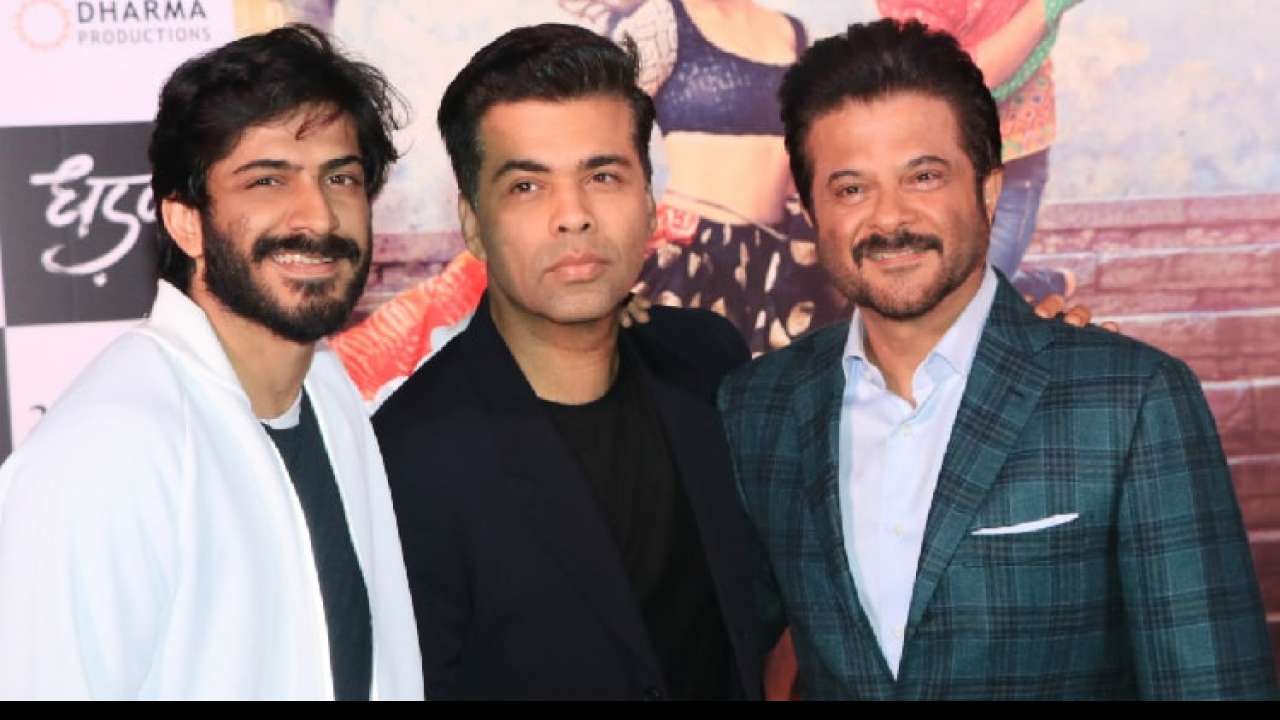 Harshvardhan and Anil Kapoor posing with Karan Johar
