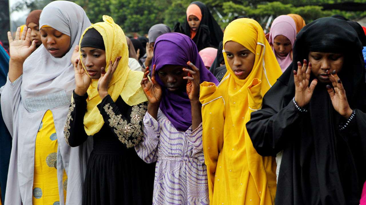 Muslims attend Eid al-Fitr prayers