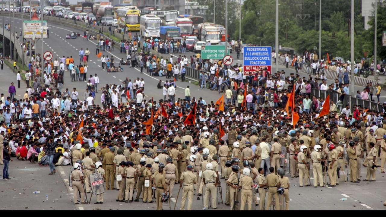 Protesters block a road