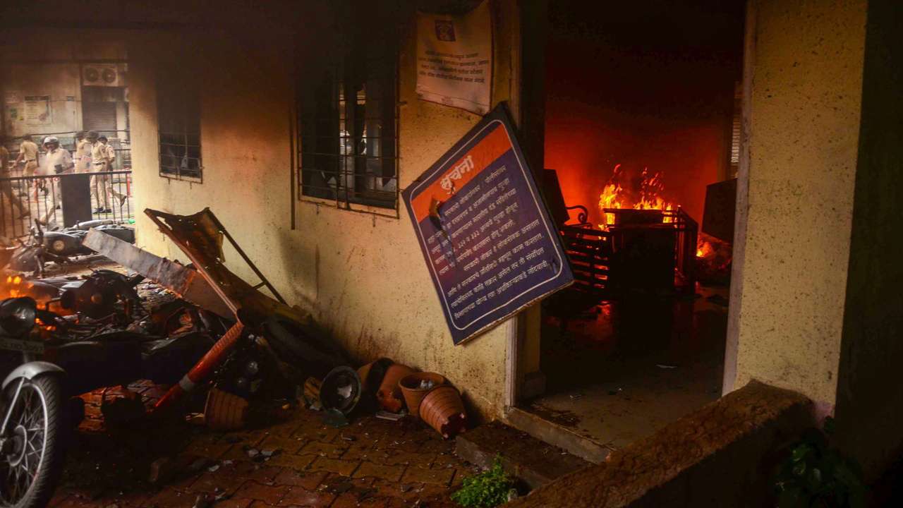 Protesters burn police outpost