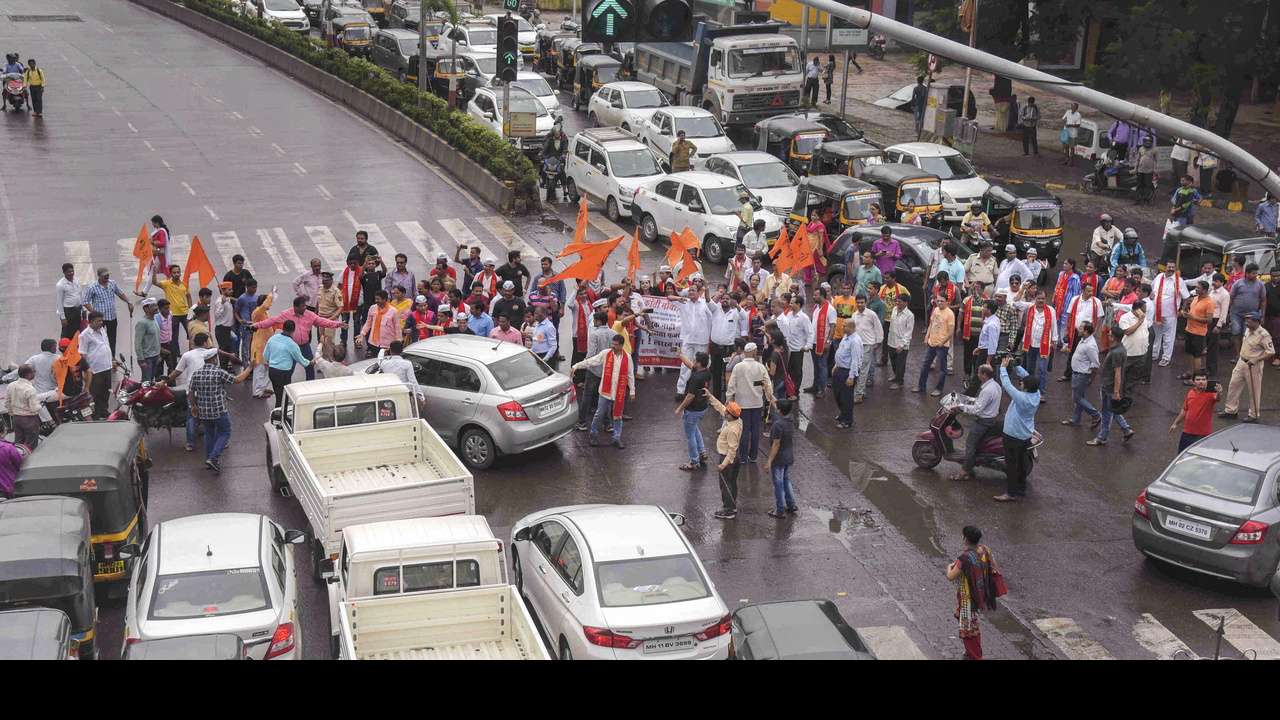 Protesters stop vehicles
