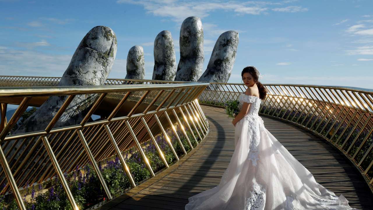 Vietnamese bride poses for her wedding photos