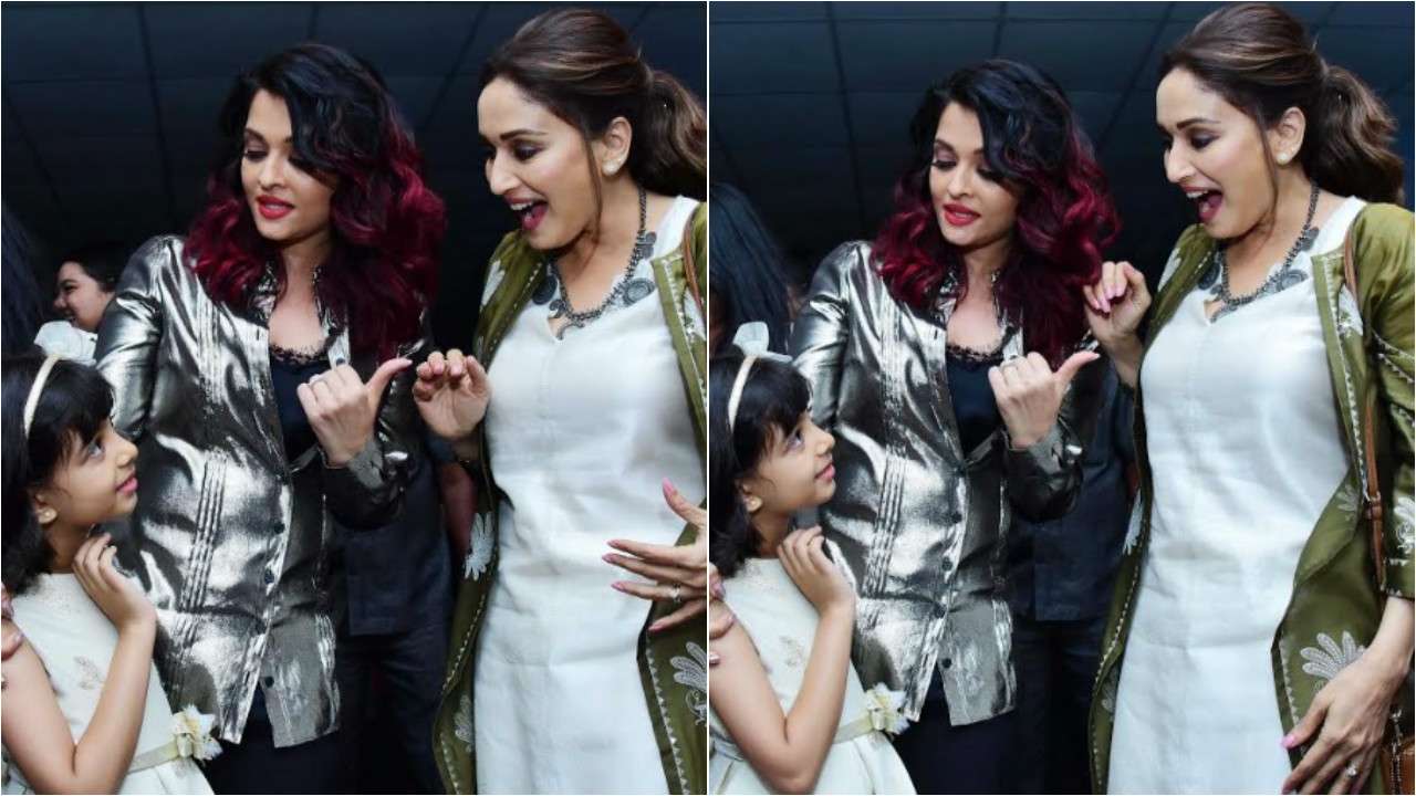 We heart Madhuri's cute expression on meeting Aaradhya