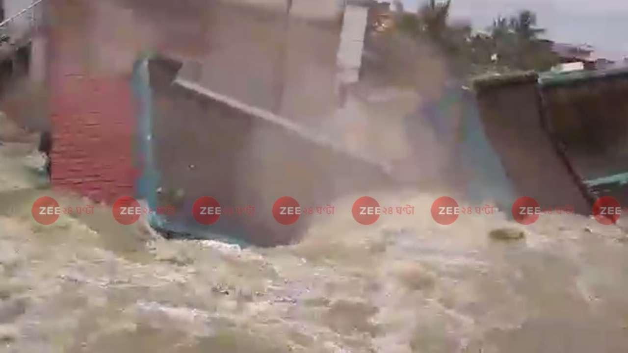 House crumbling under rain