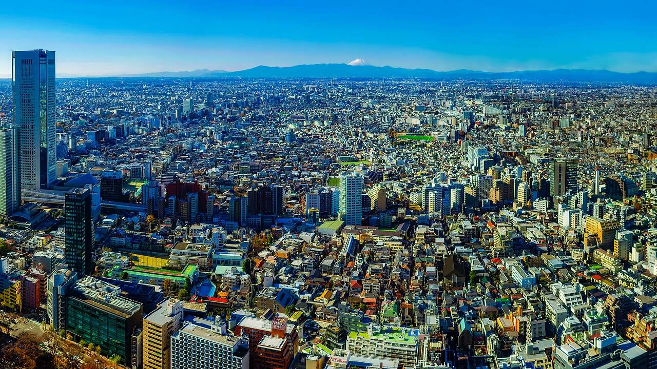 Tokyo unscathed as weakening typhoon brushes by, heads north