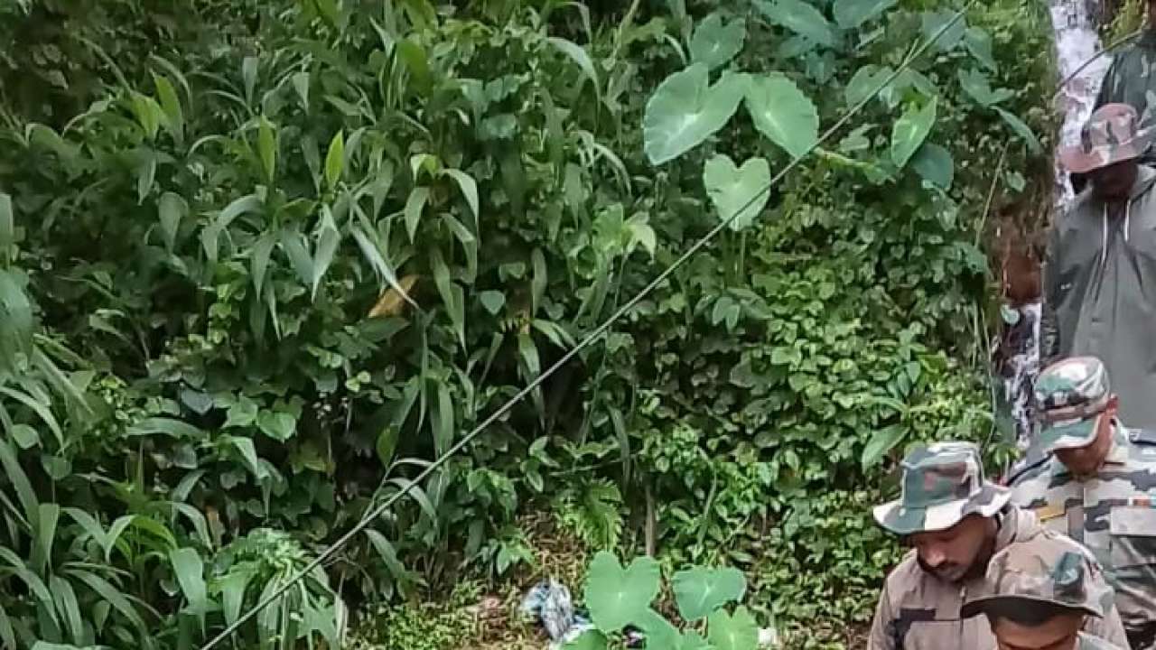 Army men carry 85-year-old lady stranded in landslide