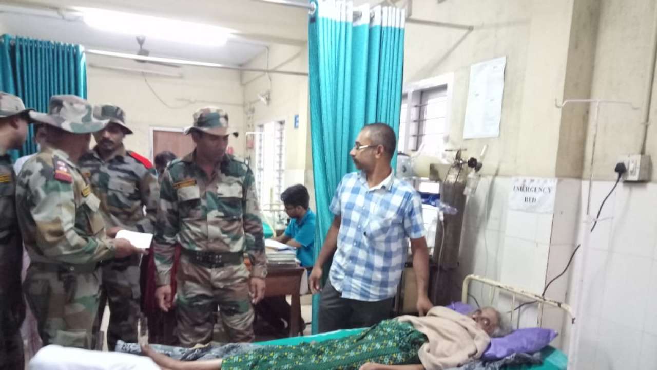 Old woman in hospital, out of danger
