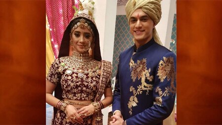 Karthik and Naira dressed like groom and bride
