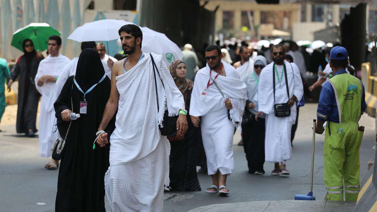 Pilgrims Walk In Street In Holy City Of Mecca