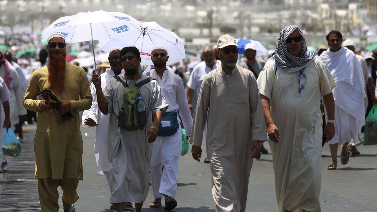 Pilgrims stroll around the holy city of Mecca