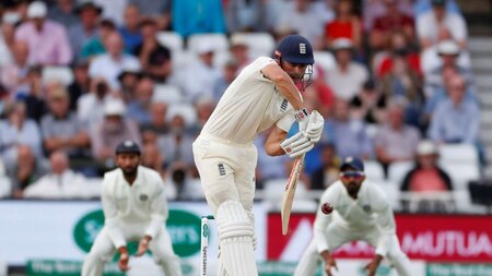 England openers survive the day