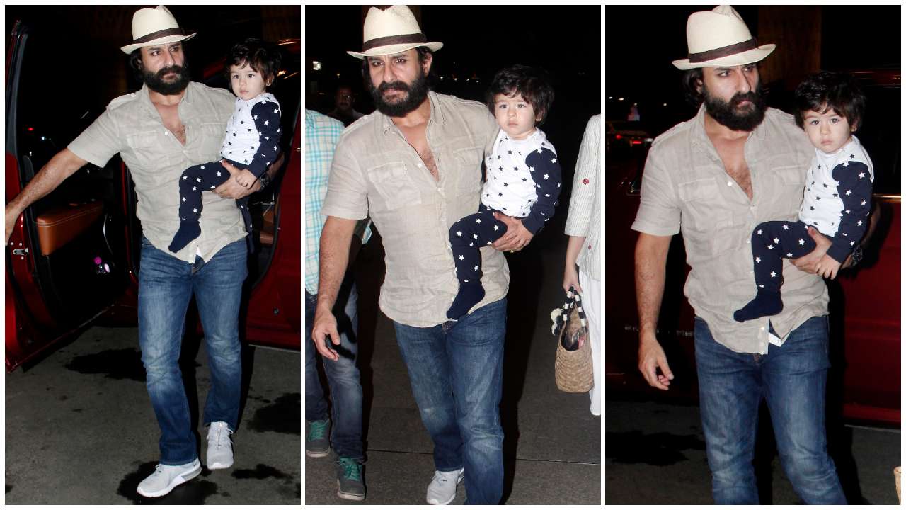 The little munchkin in his daddy's arms